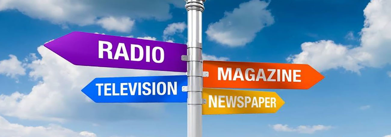 a sign post with labels, Radio, Television, Magazine and Newspaper