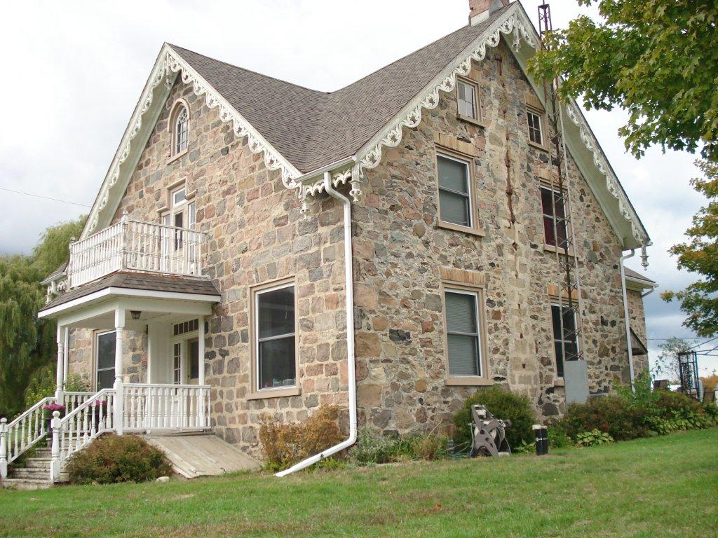 Stone house with decorative trim