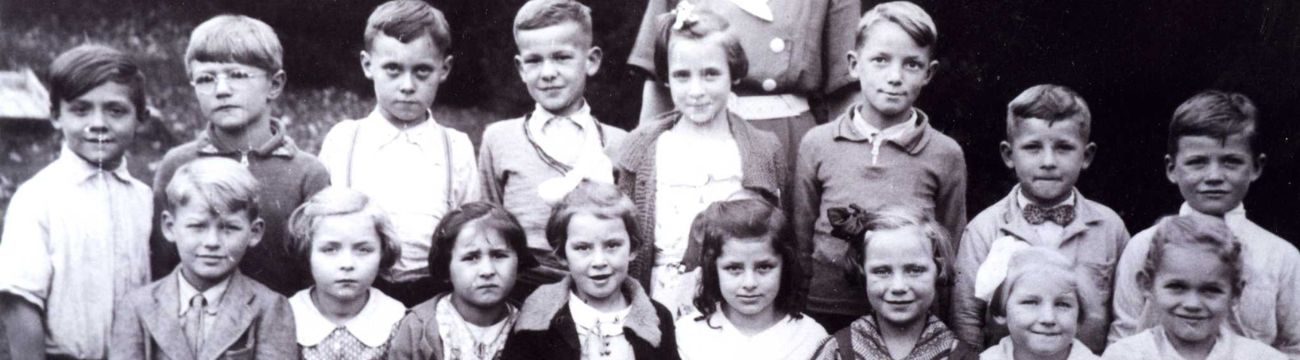 School children from the 1930s two rows boys in back row of girls in front
