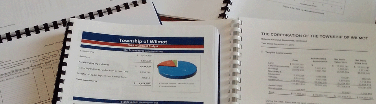 Budget and Finance Reports Open on Table